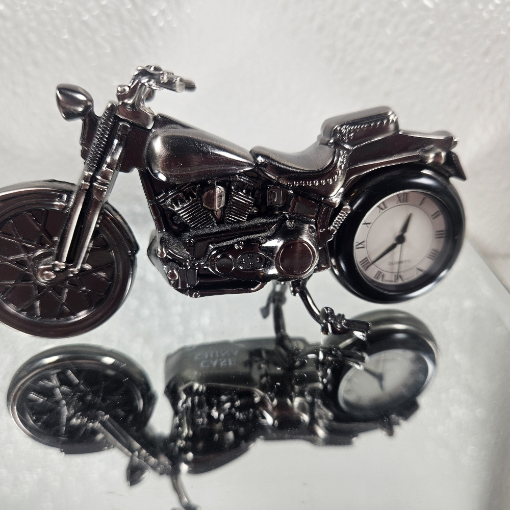 Clock. Mini motorcycle.